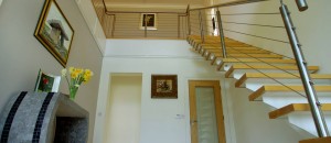 Glider modern stairs with wire rope balustrade