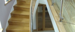 Curved staircase with stainless steel balustrade
