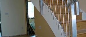 Helical stainless steel balustrade in curved staircase
